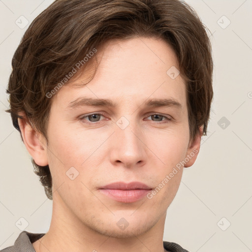 Neutral white young-adult male with short  brown hair and grey eyes