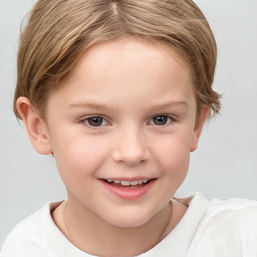 Joyful white child female with short  brown hair and brown eyes