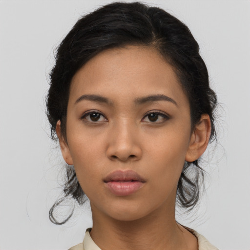 Neutral asian young-adult female with medium  black hair and brown eyes