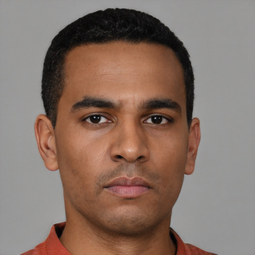 Neutral latino young-adult male with short  brown hair and brown eyes
