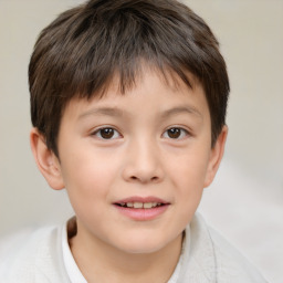 Joyful white child male with short  brown hair and brown eyes