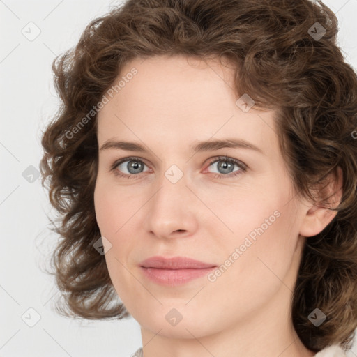 Joyful white young-adult female with medium  brown hair and green eyes