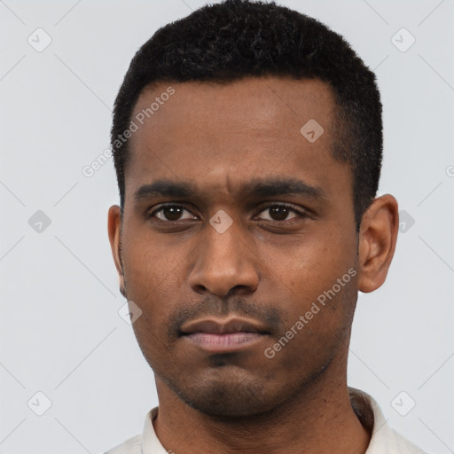 Neutral black young-adult male with short  black hair and brown eyes