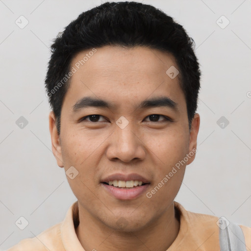 Joyful asian young-adult male with short  black hair and brown eyes