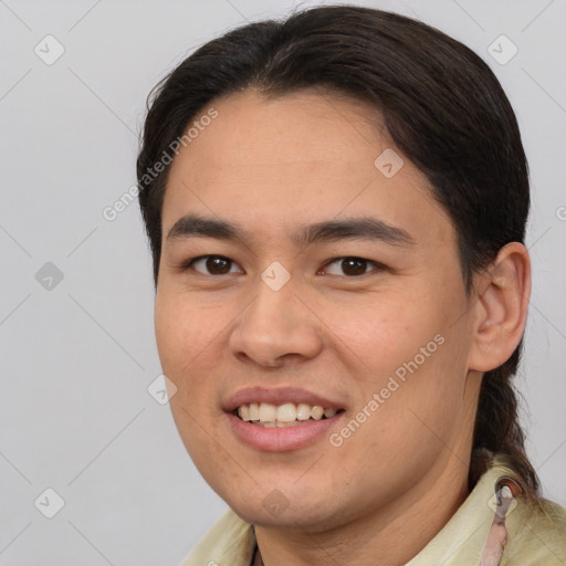 Joyful white young-adult male with medium  brown hair and brown eyes