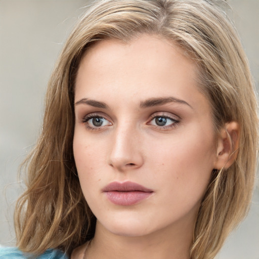 Neutral white young-adult female with medium  brown hair and green eyes