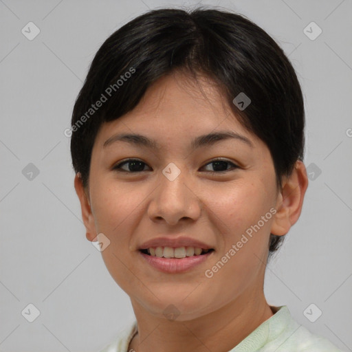 Joyful asian young-adult female with short  brown hair and brown eyes