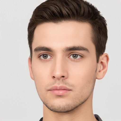 Neutral white young-adult male with short  brown hair and brown eyes