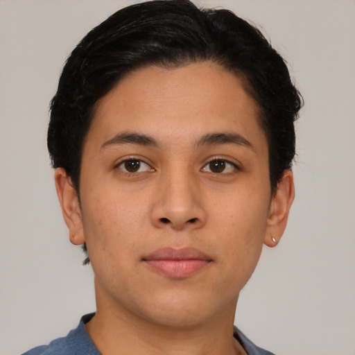 Neutral latino young-adult male with short  brown hair and brown eyes