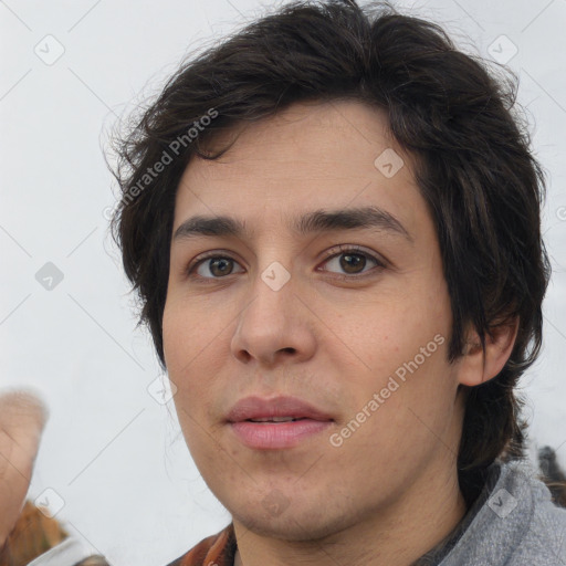 Joyful white young-adult male with medium  brown hair and brown eyes