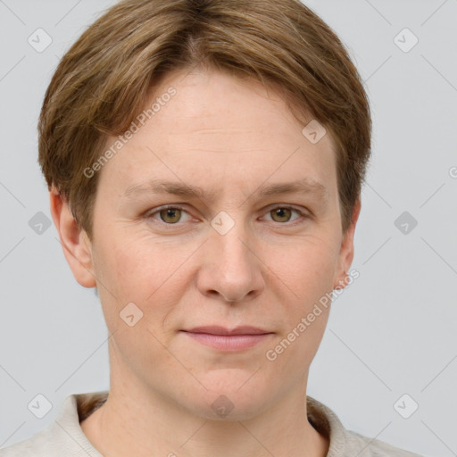 Joyful white young-adult female with short  brown hair and grey eyes