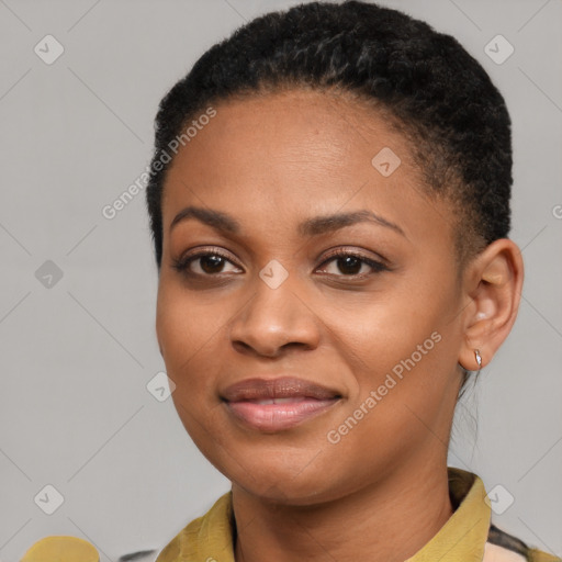 Joyful black young-adult female with short  brown hair and brown eyes