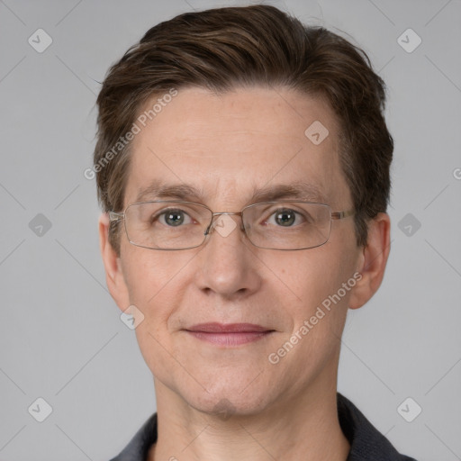 Joyful white adult male with short  brown hair and grey eyes