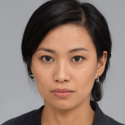 Neutral asian young-adult female with medium  brown hair and brown eyes