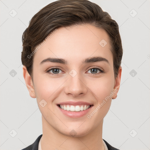 Joyful white young-adult female with short  brown hair and brown eyes