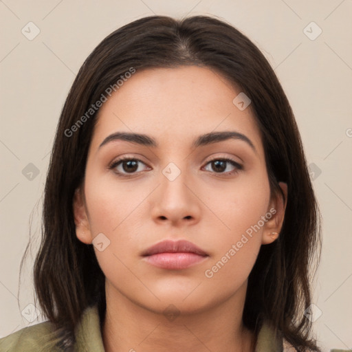 Neutral white young-adult female with long  brown hair and brown eyes