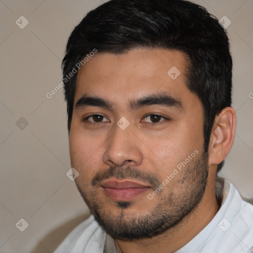 Joyful asian young-adult male with short  black hair and brown eyes