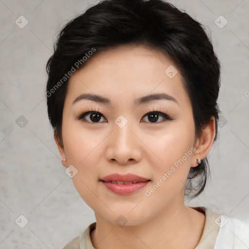 Joyful asian young-adult female with medium  black hair and brown eyes