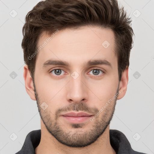 Neutral white young-adult male with short  brown hair and grey eyes