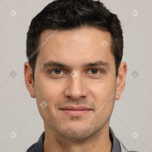 Joyful white young-adult male with short  brown hair and brown eyes