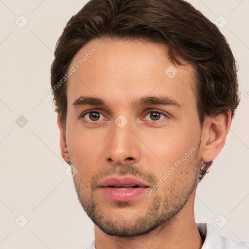 Joyful white young-adult male with short  brown hair and brown eyes