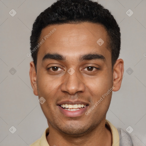 Joyful black young-adult male with short  black hair and brown eyes