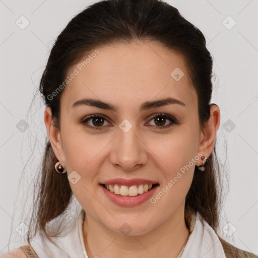 Joyful white young-adult female with medium  brown hair and brown eyes