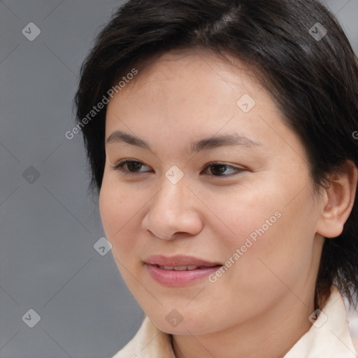 Joyful white young-adult female with medium  brown hair and brown eyes