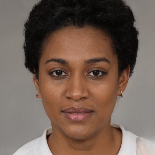 Neutral black young-adult female with short  black hair and brown eyes