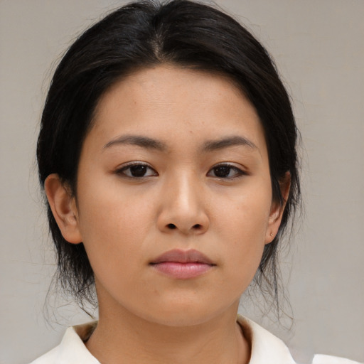 Neutral asian young-adult female with medium  brown hair and brown eyes