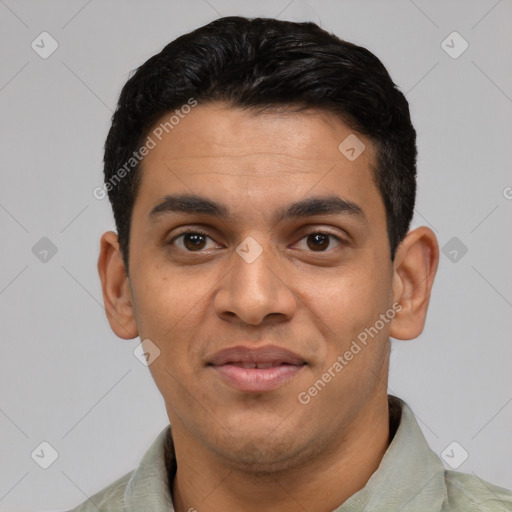 Joyful latino young-adult male with short  black hair and brown eyes