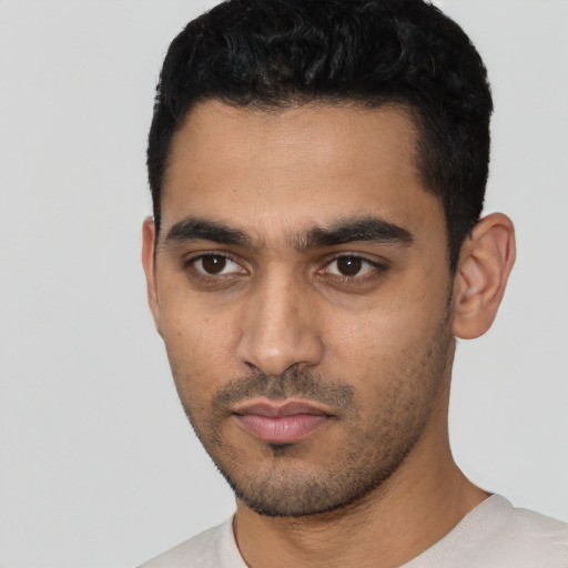 Neutral latino young-adult male with short  black hair and brown eyes