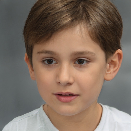 Joyful white child male with short  brown hair and brown eyes