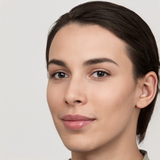 Neutral white young-adult female with medium  brown hair and brown eyes