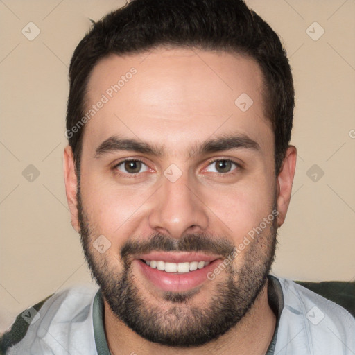 Joyful white young-adult male with short  black hair and brown eyes