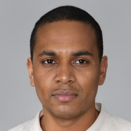 Neutral black adult male with short  black hair and brown eyes
