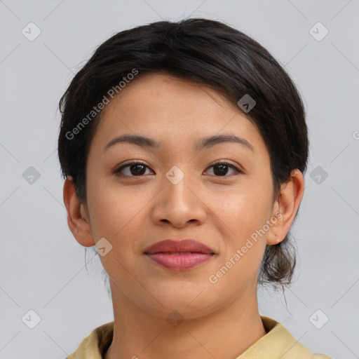 Joyful asian young-adult female with short  brown hair and brown eyes