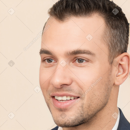 Joyful white young-adult male with short  brown hair and brown eyes