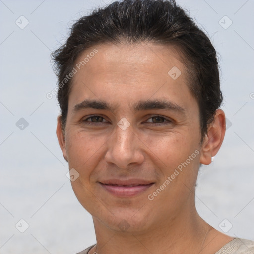 Joyful white young-adult male with short  brown hair and brown eyes