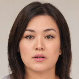 Neutral asian young-adult female with medium  brown hair and brown eyes