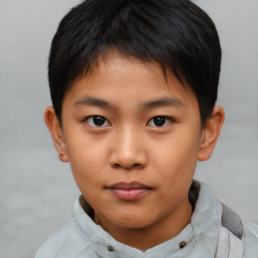Neutral asian child male with short  brown hair and brown eyes