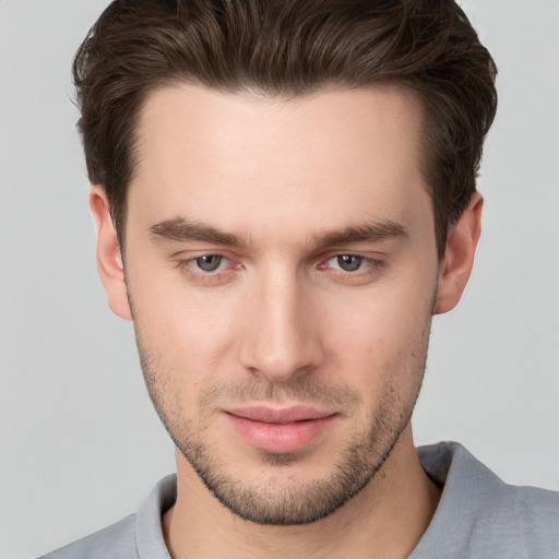 Neutral white young-adult male with short  brown hair and brown eyes