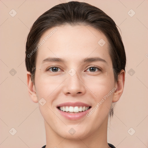 Joyful white young-adult female with short  brown hair and brown eyes