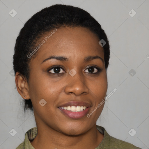 Joyful black young-adult female with short  brown hair and brown eyes