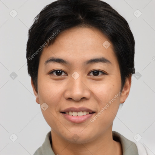 Joyful asian young-adult female with short  brown hair and brown eyes