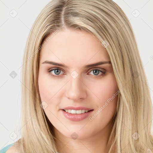 Joyful white young-adult female with long  brown hair and green eyes