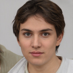 Neutral white young-adult female with short  brown hair and brown eyes