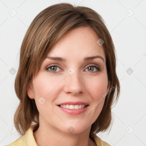 Joyful white young-adult female with medium  brown hair and blue eyes