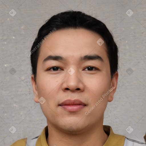 Joyful white young-adult male with short  black hair and brown eyes