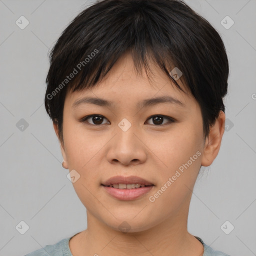 Joyful asian young-adult female with short  brown hair and brown eyes